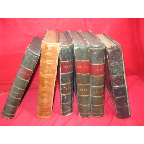 292 - A selection of leather-bound volumes of Punch magazine ranging from 1880 to 1895