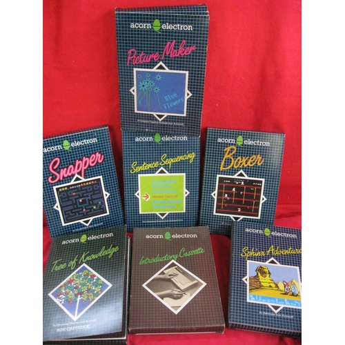 297 - Boxed software for Acorn Electron computers - 6 on cassette, one on cartridge.