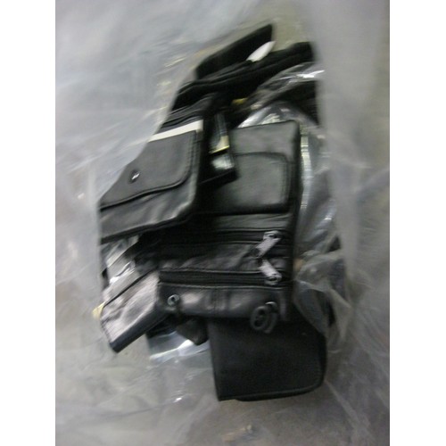 54 - A mixed selection of approximately 25 wallets and purses, all new an unused, mainly of leather