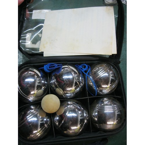 51 - A set of six carpet boules in original case with instructions