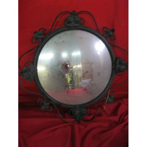 354 - A mirror in a wrought iron-type metal frame