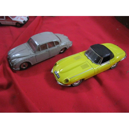 357 - A vintage Dinky Jaguar, a newer Dinky Jaguar E-Type and 3 other die-cast vehicles