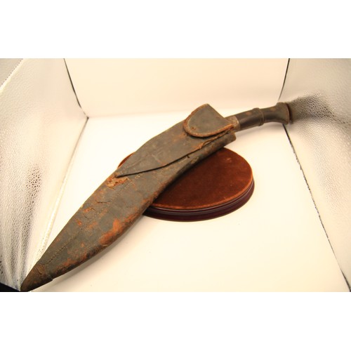 148 - A WW1 military Mark II Gurkha Kukri in original leather-covered wooden scabbard, stamped for maker D... 