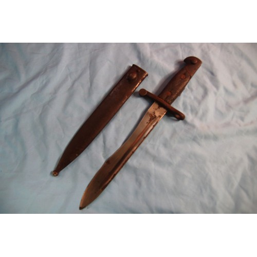 146 - A Spanish M1941 Bayonet in scabbard for the M1943 8mm Mauser Rifle, matching numbers on scabbard and... 