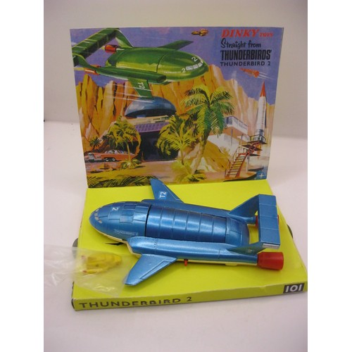 194 - A Dinky Toys #101 Thunderbird 2 & 4, boxed and in mint condition