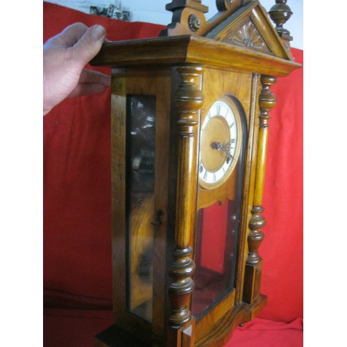 203 - An imposing Black Forest style Vienna Regulator clock in running order, with correct pendulum and ke... 