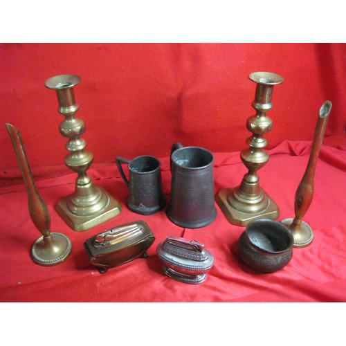 64 - A selection of Brass candlesticks,spill vases ,pewter and other metal items including two lighter on... 