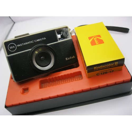 249 - An assortment of cameras including a boxed Kodak 56-x Instamatic outfit with sealed 126 film in clea... 