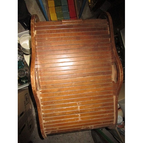 262 - A vintage floor standing sewing basket with roll top, includes contents