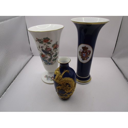 17 - A Kutani Crane spill vase seven inches tall along with a NG royal blue vase and a little Chinese exp... 