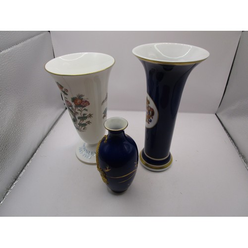 17 - A Kutani Crane spill vase seven inches tall along with a NG royal blue vase and a little Chinese exp... 