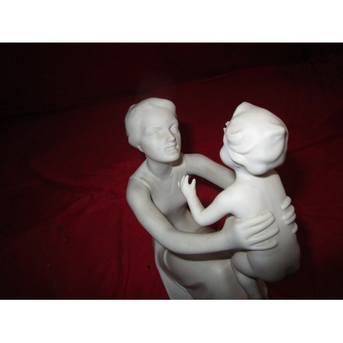 5 - A Lovely Kaiser Porcelain figurine of a sitting Mother and her child .
Eight inches by 8 inches.