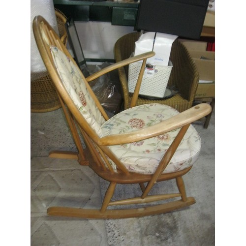 273 - A 1970s low Ercol Rocking Chair with cushions