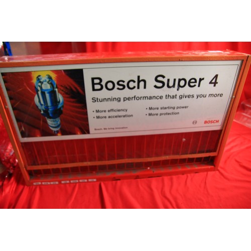 56 - A vintage Bosch spark plug rack in good order