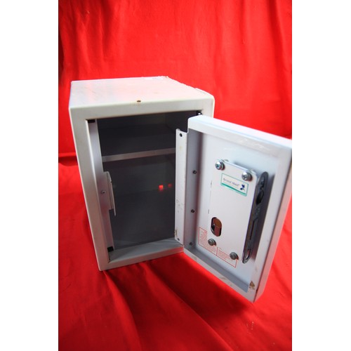 58 - A small safe with key