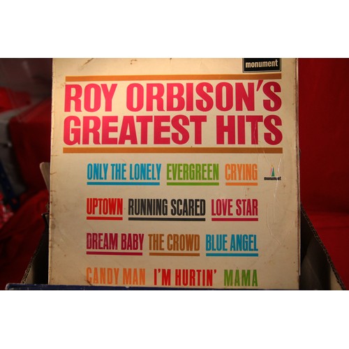 82 - A box of 7 inch singles and LPs including Rolling stones, Rod Stewart, Chuck Berry, Roy Orbison, Abb... 