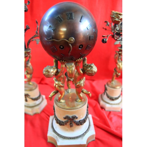 31 - A 19th Century French Bronze, Ormulu and Marble figural mantle spherical ball clock with enamel Roma... 