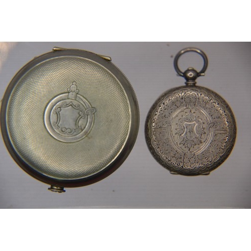 129 - A pair of pocket watches, the smaller Swiss with ornately decorated .935 silver case and floreat gol... 