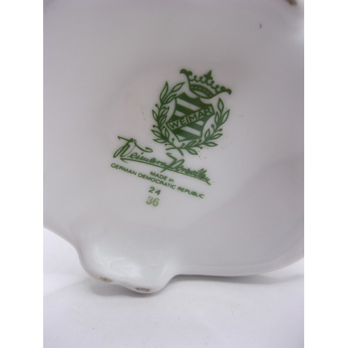 137 - Pair of Weimar Porzellan white porcelain candlesticks, scrolled stem, gilding and decorated with flo... 