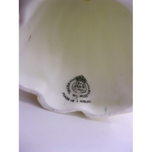 138 - Royal Worcester candle snuffer or extinguisher 'Jenny Lind', modelled as woman in yellow dress with ... 