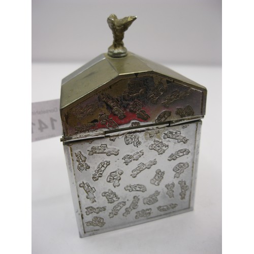 141 - A table cigarette lighter modelled as a Rolls Royce grille with Spirit of Ecstasy, chromium plate li... 