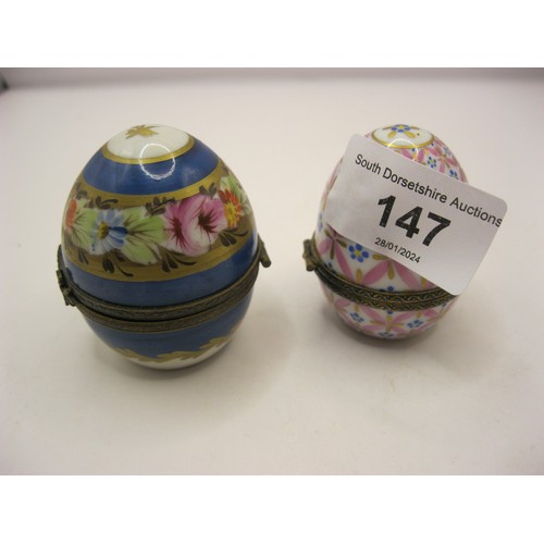 147 - Two porcelain boxes - (1) an egg-shape box, hinged, interior with a more recent replacement scent bo... 