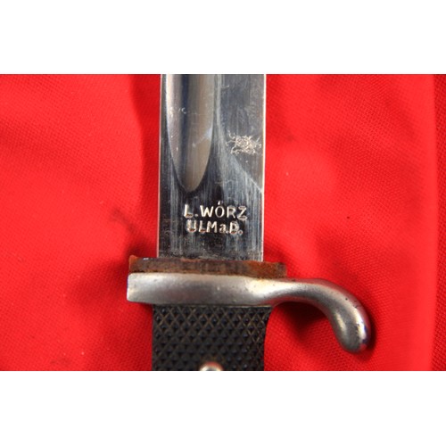 9 - A German K98 Ceremonial Bayonet with nickel-plated hilt and blade, marked for L Worz to one side of ... 