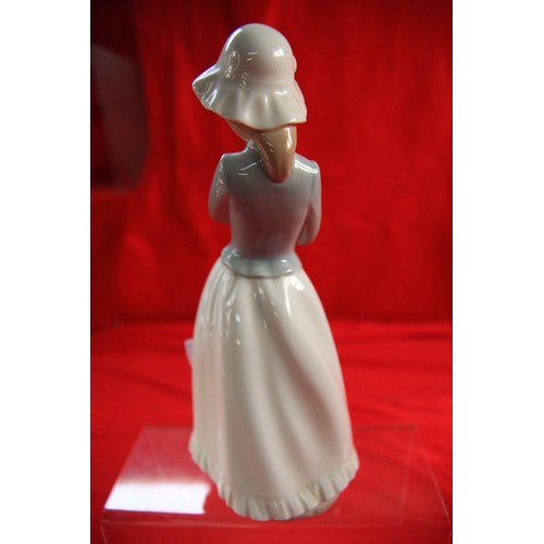 51 - Nao figure of girl in bonnet with puppy, 24.5cm