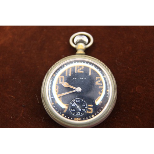 6 - Waltham military pocket watch with black dial and screw back, crown winding, movement inscribed WALT... 