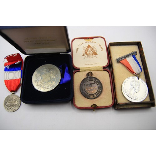 139 - 4 commemorative medallions including Coronation and Exeter Police