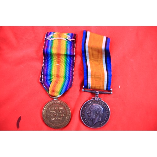 213 - A WW1 British War Medal and Victory Medal, both with ribbons and named to 4079 Pte W Forgham Northum... 