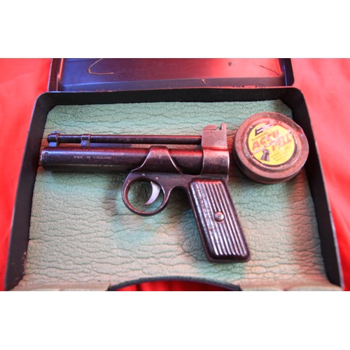 244 - A vintage Webley Junior .177 calibre air pistol in carry case with pellets, early metal grips, seria... 