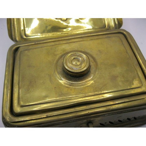 261 - A brass Betel Box with interior trays and cover, inscription to front of lid. Hinged cover and handl... 