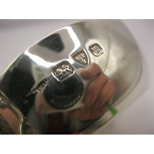 285 - A sterling silver tastevin, double-handled, hallmarked for Chester 1937, maker's mark polished away ... 