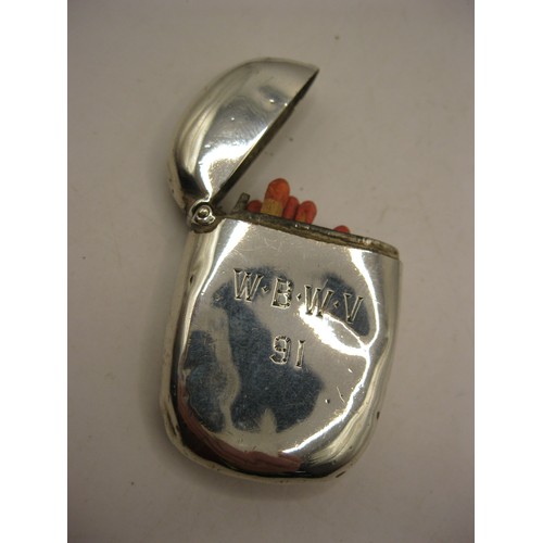 287 - A sterling silver lozenge-shaped vesta case hallmarked for Birmingham 1879, maker's mark worn away, ... 