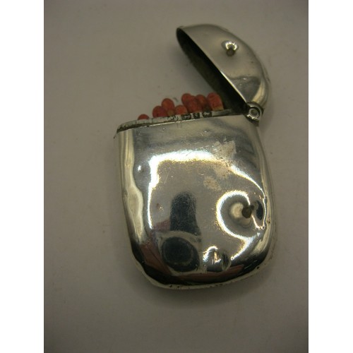 287 - A sterling silver lozenge-shaped vesta case hallmarked for Birmingham 1879, maker's mark worn away, ... 