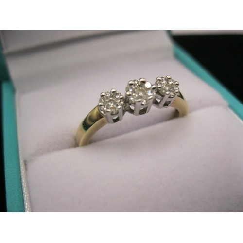 289 - A 9 carat gold ring set with 3 individual diamond clusters, very decorative, size N, approx weight 2... 