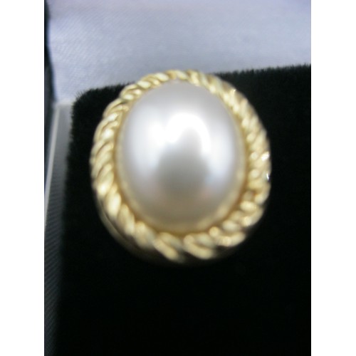 301 - A large pair of pearl earrings in 9 carat gold, cased