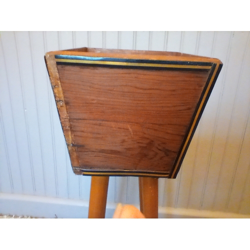 311 - A 1960s wooden plant stand on Sputnik legs, small area of trim missing, 25