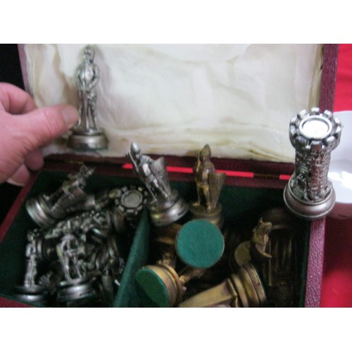 280 - A boxed resin chess set in pristine condition