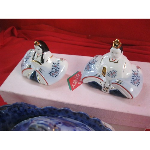 82 - A boxed pair of japanese Hina dolls along with a teapot of oriental origins on stand and two small M... 