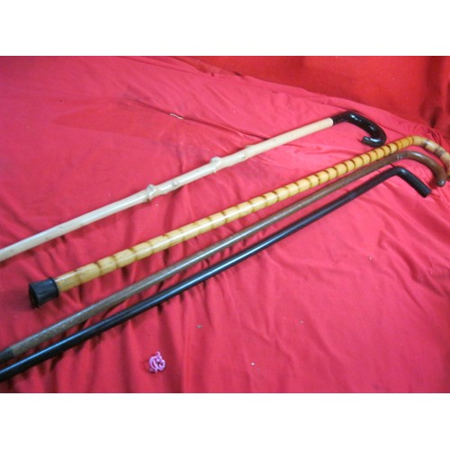 136 - 4 vintage wooden walking sticks in good order