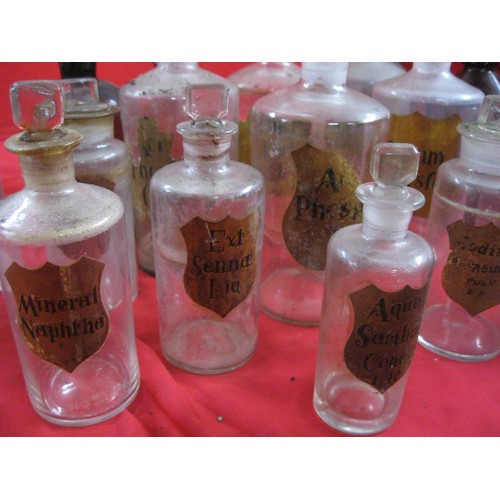 56 - A crate of Apothecary Bottles, many of blown and not moulded glass with etched stoppers