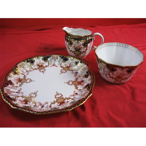 124 - A Royal Crown Derby plate, sugar bowl and milk/cream jug, all circa 1919