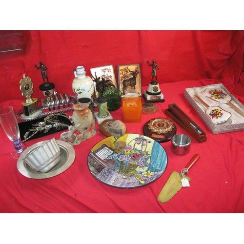 110 - A box of mixed decorative and household items including darts trophies, an aluminium jelly mould, la... 