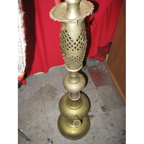 105 - Middle eastern brass hookah, baluster column on circular foot, height about 154cm, some fittings sli... 