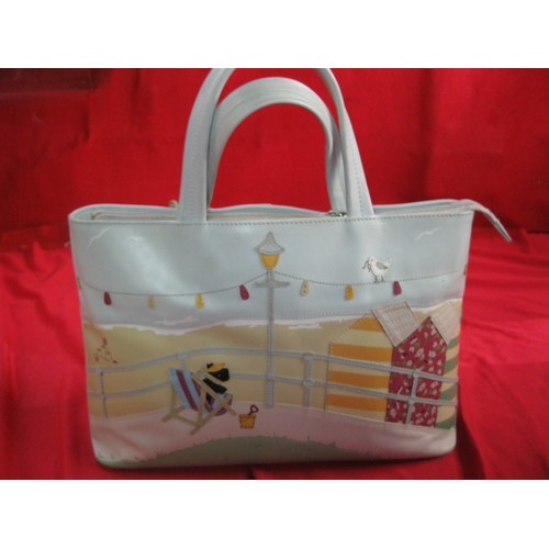 160 - Large Radley handbag decorated with seaside scenes, with dog tag, in good condition