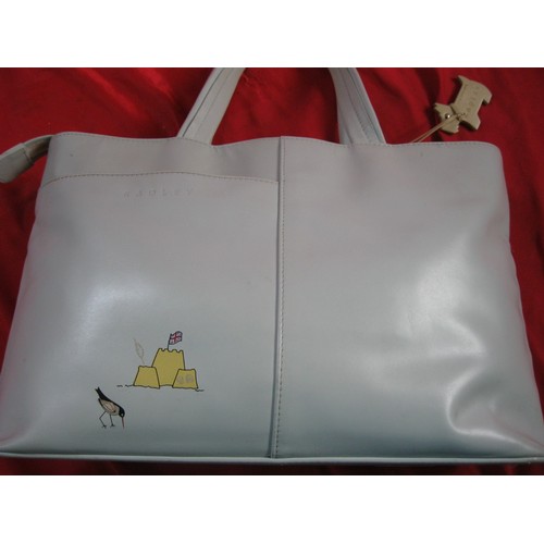 160 - Large Radley handbag decorated with seaside scenes, with dog tag, in good condition