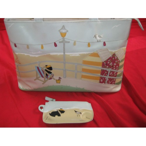 160 - Large Radley handbag decorated with seaside scenes, with dog tag, in good condition