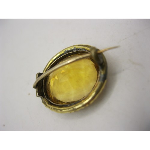 222 - An antique brooch featuring an impressive citrine in a 9 carat gold mount, total approx weight 3.86g